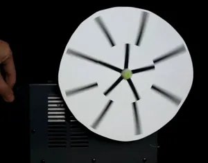 An animation of a spoked wheel that appears to rotate backwards while it is actually turning forwards